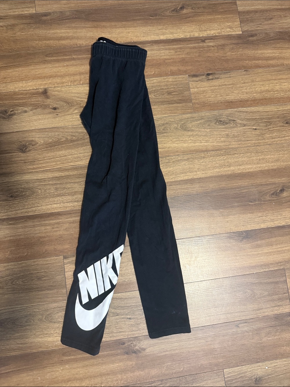 Nike Kids Black Leggings with White Swoosh Logo
